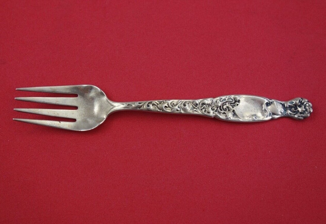Whiting Heraldic Sterling Silver Ramekin Fork 4 7/8 Inches: Whiting Heraldic Sterling Silver Ramekin Fork 4 7/8 Inches This exquisite ramekin fork is crafted from high-quality sterling silver by Whiting, showcasing the elegant Heraldic pattern. Measuring 4 7/8