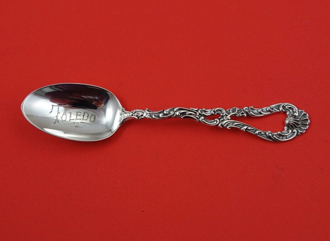 Durgin Alcazar Sterling Silver Teaspoon Monogrammed 5 3/4": Durgin Alcazar Sterling Silver Teaspoon Monogrammed 5 3/4" This exquisite Alcazar teaspoon by Durgin is crafted from high-quality sterling silver, ensuring both durability and elegance. Measuring 5 3/