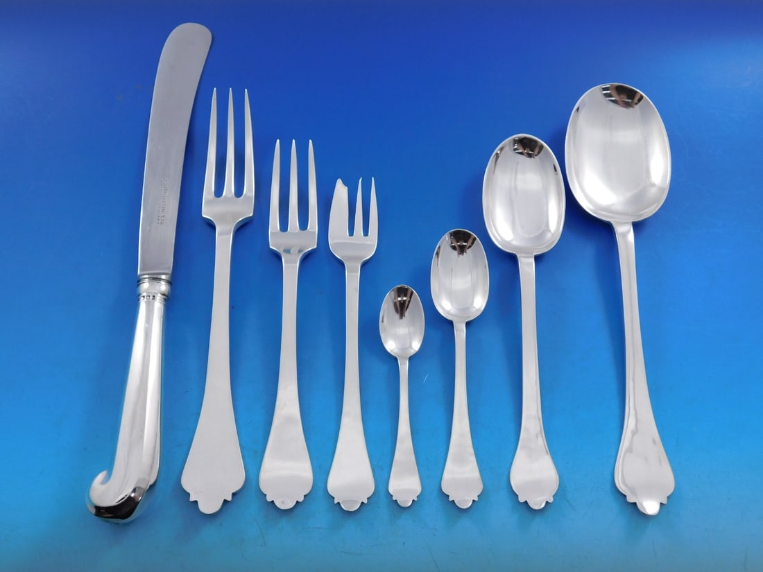 32 Piece Trifid Pattern Sterling Silver Flatware Set by Crichton English: 32 Piece Trifid Pattern Sterling Silver Flatware Set by Crichton English This Trifid pattern flatware set by Crichton Bros. includes 32 dinner-size pieces crafted in sterling silver. The set features