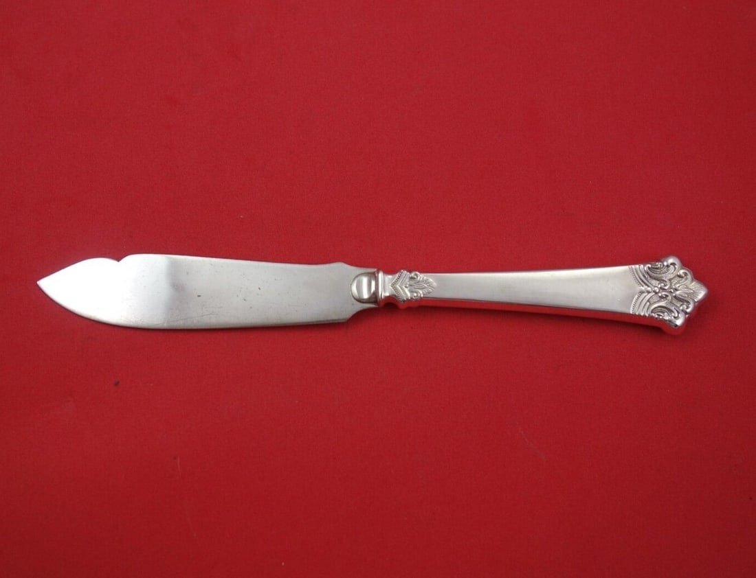 Th. Olsens Anitra .830 Silver Fish Knife Hollow Handle 7 5/8": Th. Olsens Anitra .830 Silver Fish Knife Hollow Handle 7 5/8" Discover the elegance of the Anitra fish knife by Th. Olsens, crafted from .830 sterling silver. This exquisite piece features a hollow ha