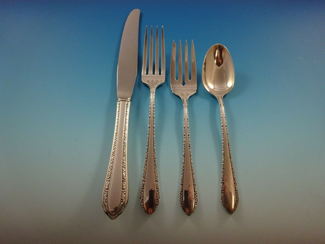 Royal Crest Wild Flower Sterling Silver 4-Piece Place Setting: Royal Crest Wild Flower Sterling Silver 4-Piece Place Setting Enhance your dining experience with this exquisite 4-piece place setting from the Wild Flower pattern by Royal Crest, crafted in high-qual