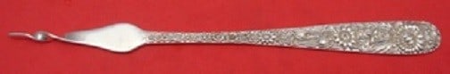 Kirk Repousse Sterling Silver Twisted Butter Pick 6 1/8": Kirk Repousse Sterling Silver Twisted Butter Pick 6 1/8" This exquisite butter pick features the classic Repousse pattern by Kirk, meticulously crafted from sterling silver. Measuring 6 1/8" in length