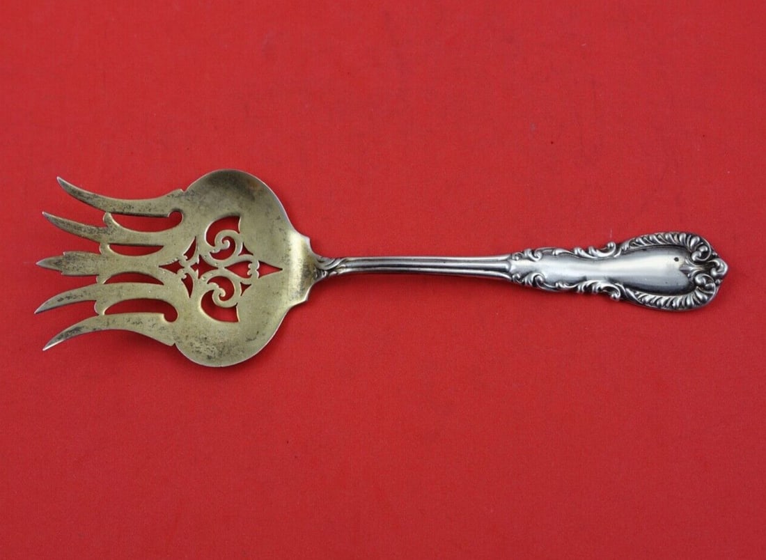 Reed & Barton Majestic Sterling Silver 5-Tine Sardine Fork 6.5": Reed & Barton Majestic Sterling Silver 5-Tine Sardine Fork 6.5" Enhance your dining experience with this beautiful Majestic by Reed & Barton Sterling Silver Sardine Fork. This elegant serving fork fea