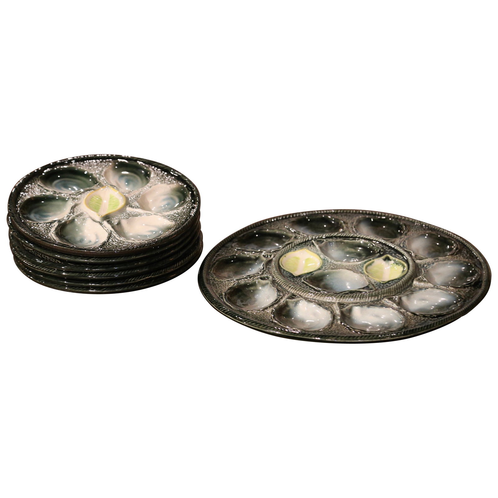 Set of 6 Saint Clement French Faience Oyster Plates With Matching Serving Platter: Set of 6 Saint Clement French Faience Oyster Plates With Matching Serving Platter This set features six colorful French oyster plates and a matching serving platter, crafted by the Saint Clement facto