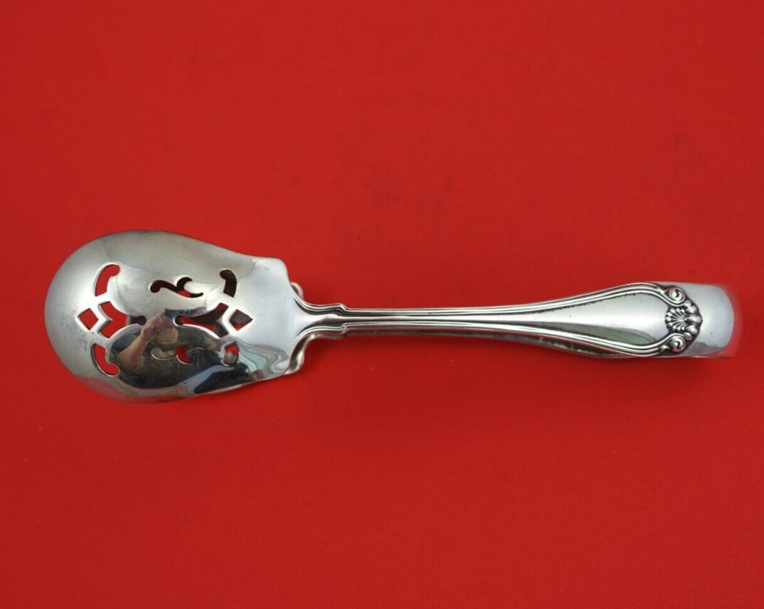 Dominick & Haff Century Sterling Silver Ice Tong 6.5 Serving Piece: Dominick & Haff Century Sterling Silver Ice Tong 6.5 Serving Piece Add a touch of elegance to your serving collection with this exquisite 6 1/2" Sterling Silver Ice Tong from the renowned Century patt