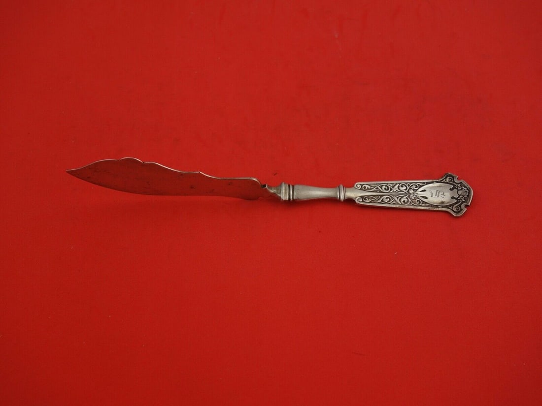 Wendt Arabesque Sterling Silver Master Butter Knife 7 3/4" Twist Handle: Wendt Arabesque Sterling Silver Master Butter Knife 7 3/4" Twist Handle This exquisite master butter knife features a beautiful twist flat handle, crafted from high-quality sterling silver. Designed i