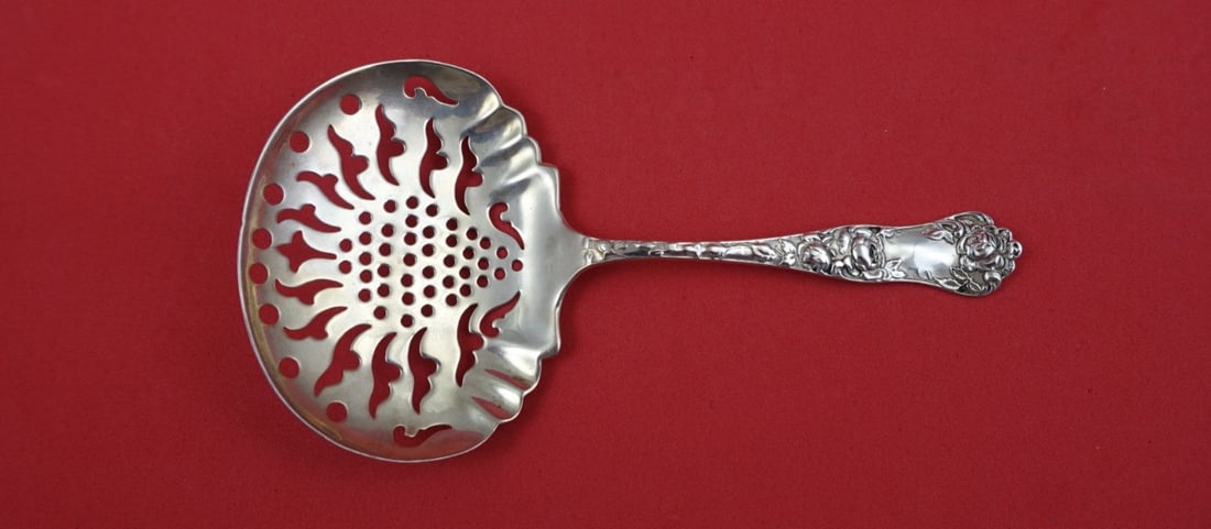 Sterling Nut Spoon with Pierced Design American Beauty Pattern Shiebler 5 Inch: Sterling Nut Spoon with Pierced Design American Beauty Pattern Shiebler 5 Inch This is a Shiebler sterling silver nut spoon in the American Beauty pattern, featuring a pierced design. The spoon measur