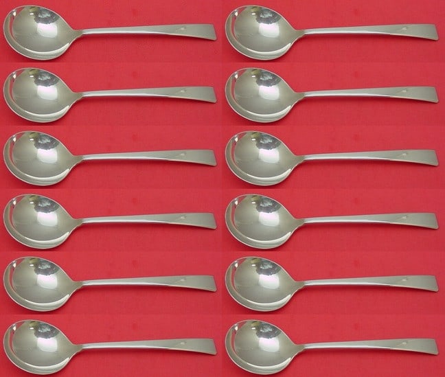 Towle Craftsman Sterling Silver Cream Soup Spoon Set 12 Pieces: Towle Craftsman Sterling Silver Cream Soup Spoon Set 12 Pieces Elevate your dining experience with this exquisite 12-piece set of Craftsman by Towle sterling silver cream soup spoons. Each spoon measu