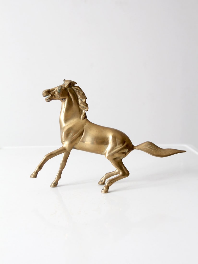 Vintage Mid Century Brass Horse Figurine 11.25 in Charming Decor: Vintage Mid Century Brass Horse Figurine 11.25 in Charming Decor This exquisite mid-century brass horse figurine embodies the spirit of motion, making it a captivating addition to any decor. Its delic