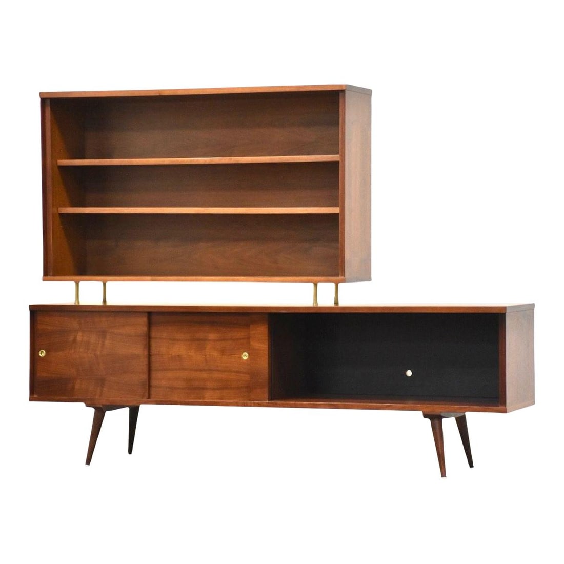 Mid-Century Modern Walnut Credenza with Brass Spacers: Mid-Century Modern Walnut Credenza with Brass Spacers Discover this stunning mid-century modern walnut credenza, expertly refinished to bring out its natural beauty. This two-piece sideboard features