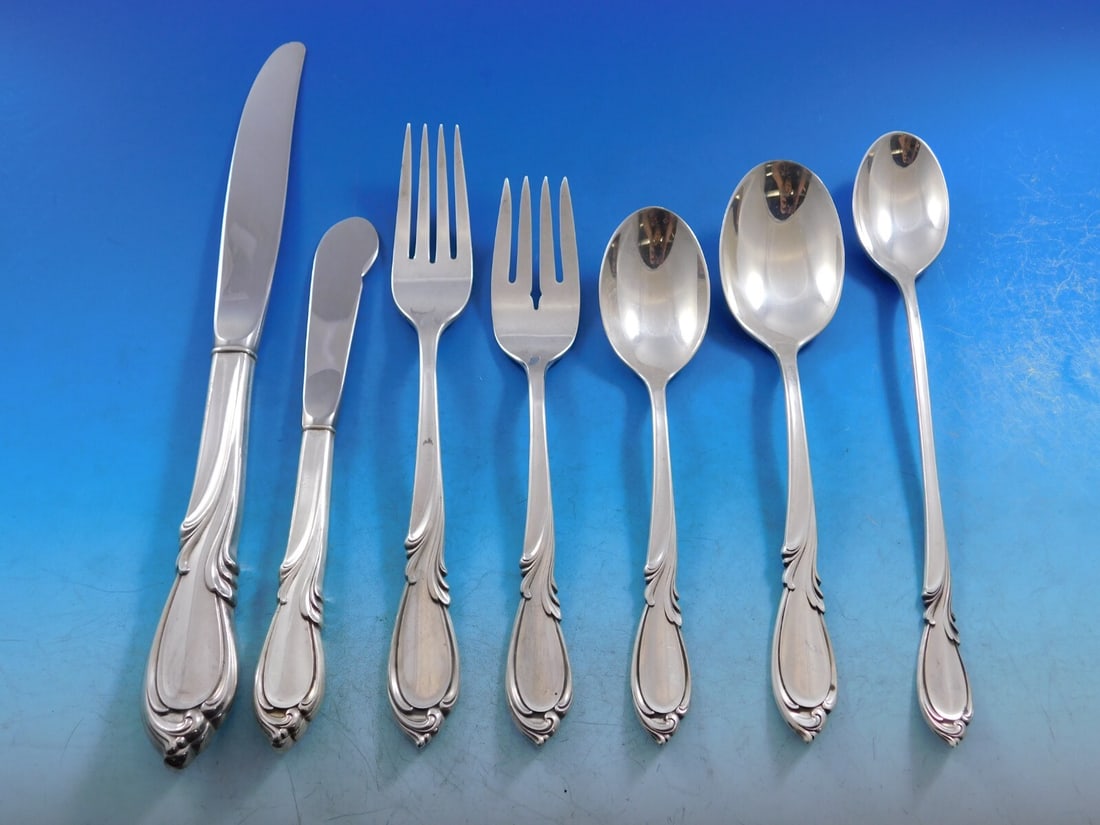 Rhapsody International Sterling Silver Flatware Set 95 Pieces for 12 with Storage Chest: Rhapsody International Sterling Silver Flatware Set 95 Pieces for 12 with Storage Chest Elevate your dining experience with the Rhapsody by International Sterling Silver Flatware Service for 12. This