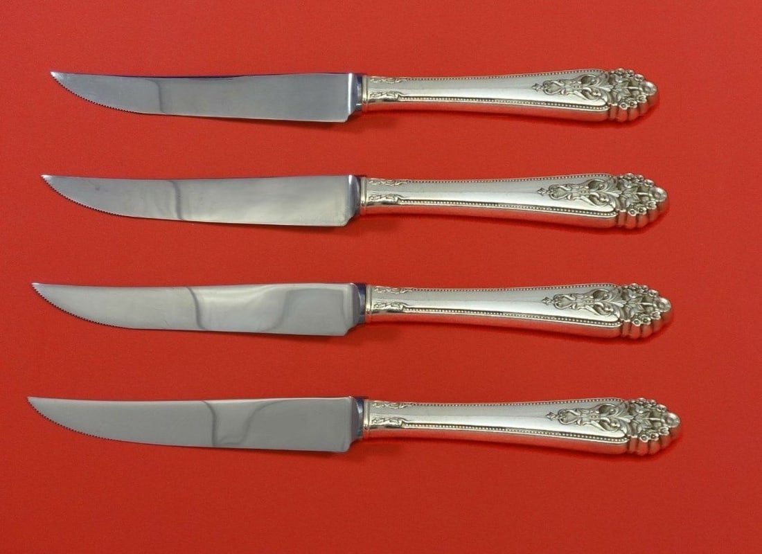 Queen's Lace International Sterling Silver Steak Knife Set 4pc Custom: Queen's Lace International Sterling Silver Steak Knife Set 4pc Custom Enhance your dining experience with this exquisite 4-piece steak knife set from the Queen's Lace pattern by International Sterling
