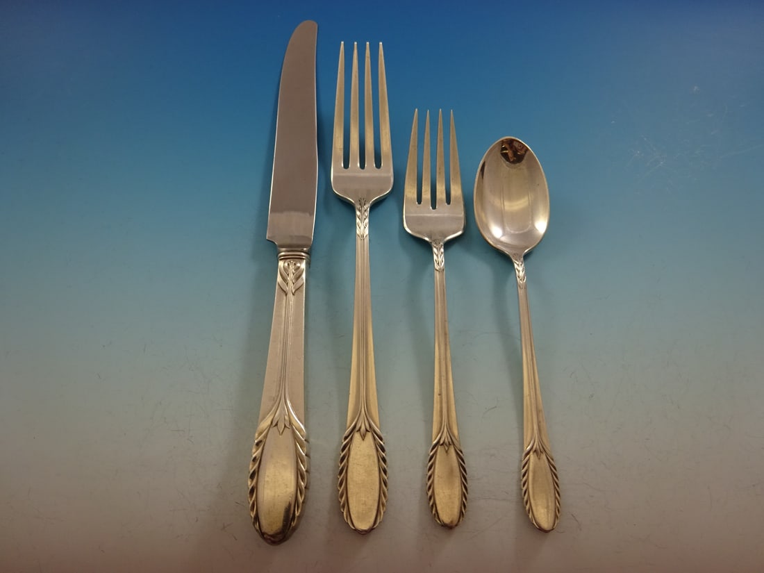 International Sterling Silver Trousseau Flatware Set 36 Pcs for 8 with Storage Chest: International Sterling Silver Trousseau Flatware Set 36 Pcs for 8 with Storage Chest This exquisite Trousseau flatware set by International Sterling is a stunning addition to any dining experience. Cr