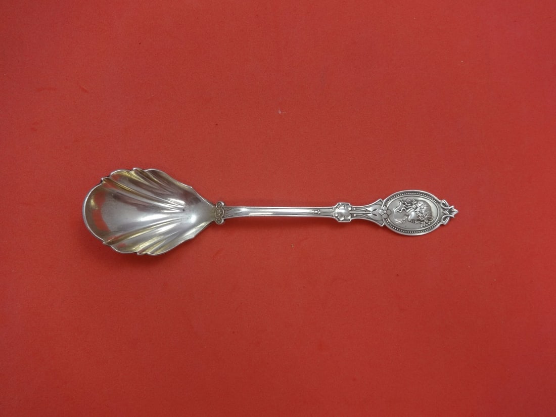 Hotchkiss & Schreuder Medallion Sterling Silver Preserve Spoon 6 3/4": Hotchkiss & Schreuder Medallion Sterling Silver Preserve Spoon 6 3/4" Introducing the Medallion Preserve Spoon by Hotchkiss & Schreuder, a stunning serving piece crafted from high-quality sterling sil