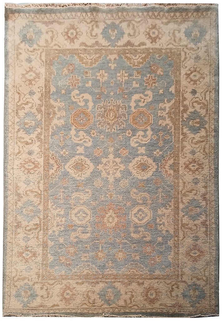 Handmade New Oushak Rug 4.1' x 6' Light Blue Wool Area Rug: Handmade New Oushak Rug 4.1' x 6' Light Blue Wool Area Rug Free continental US Shipping Discover the elegance of our 4' x 6' New Oushak Rug, meticulously handcrafted to highlight the rich tradition of
