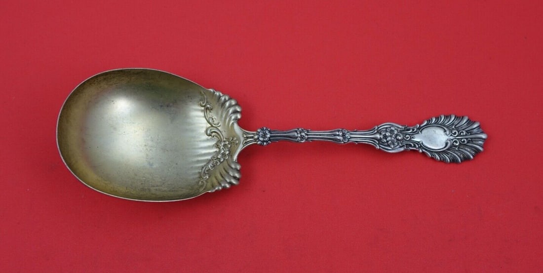 Whiting Radiant Sterling Silver Preserve Spoon Gold Wash 7.75": Whiting Radiant Sterling Silver Preserve Spoon Gold Wash 7.75" This exquisite preserve spoon from the Radiant pattern by Whiting is crafted from sterling silver, featuring a beautiful gold wash finish