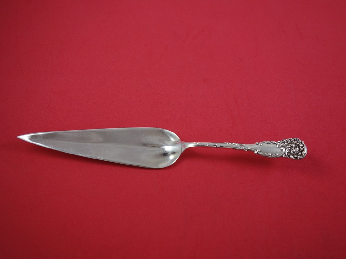 Reed and Barton La Reine Sterling Silver Jelly Cake Server 9 3/8": Reed and Barton La Reine Sterling Silver Jelly Cake Server 9 3/8" Presenting the exquisite La Reine jelly cake server by Reed and Barton, crafted from high-quality sterling silver. This elegant server