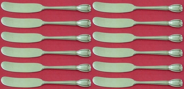 Tiffany & Co Castilian Sterling Silver Butter Spreader Set 12pcs 6": Tiffany & Co Castilian Sterling Silver Butter Spreader Set 12pcs 6" Enhance your dining experience with this exquisite 12-piece set of butter spreaders from Tiffany & Co., featuring the elegant Castil