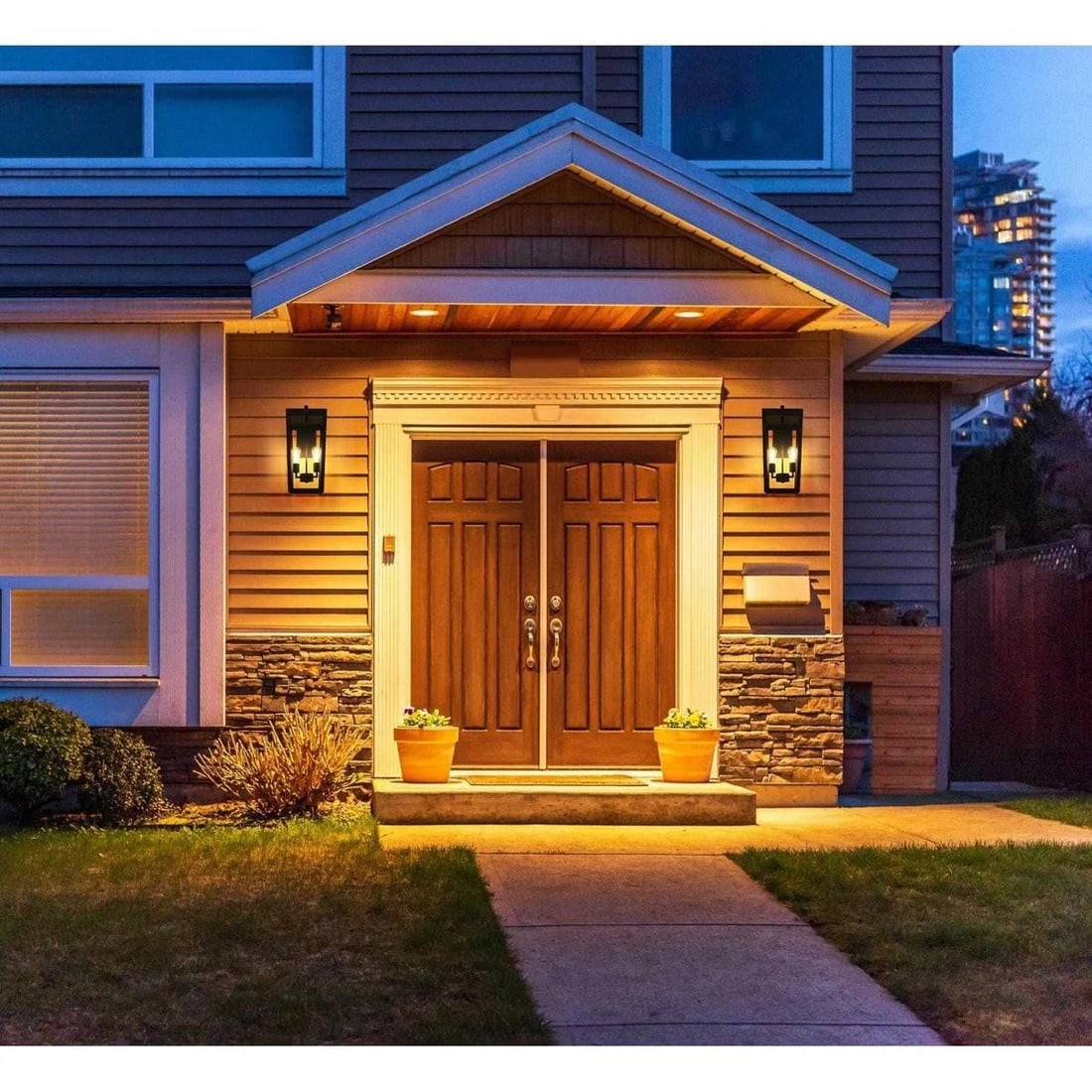 William Series 24 Inch Black Glass Outdoor Wall Lantern with Two Lights: William Series 24 Inch Black Glass Outdoor Wall Lantern with Two Lights This large outdoor wall sconce features a classic black finish and is crafted from durable iron and clear glass. Designed for ex