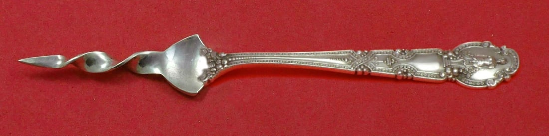 Tiffany & Co Renaissance Sterling Silver Twisted Butter Pick 5 3/4": Tiffany & Co Renaissance Sterling Silver Twisted Butter Pick 5 3/4" Enhance your dining experience with the Renaissance Butter Pick by Tiffany & Co. Crafted from high-quality sterling silver, this cus