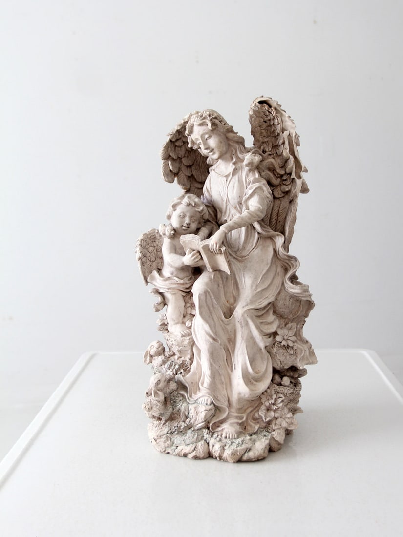 Charming Vintage Resin Angel Cherub Garden Sculpture 19.5 in: Charming Vintage Resin Angel Cherub Garden Sculpture 19.5 in Enhance your garden with this delightful vintage garden angel sculpture, featuring a charming angel and cherub in a thoughtful embrace that