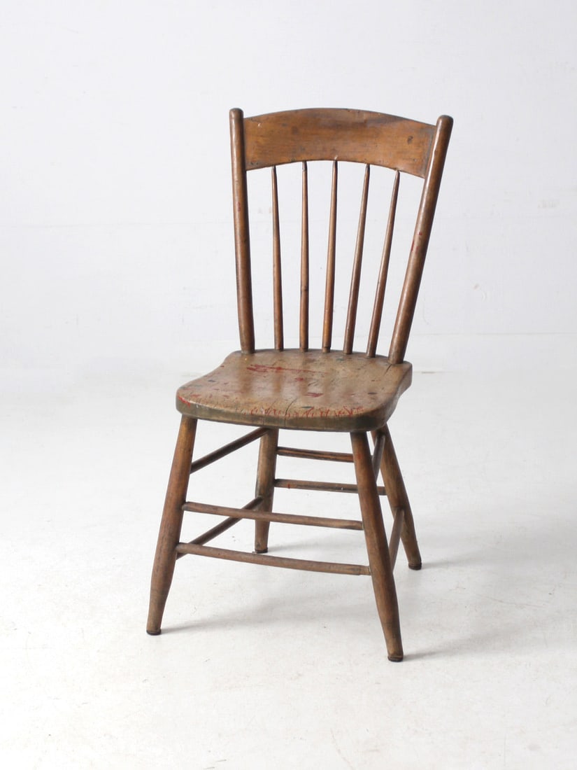 Antique Primitive Farmhouse Chair with Spindle Back and Aged Finish: Antique Primitive Farmhouse Chair with Spindle Back and Aged Finish This antique farmhouse chair exudes a charming, timeworn appeal perfect for dining areas, entryways, or accent corners. Its primitiv
