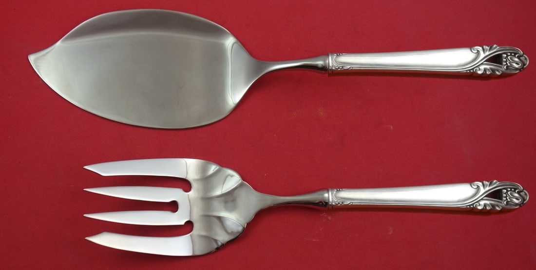International Silver Spring Glory Salmon Serving Set 2-Piece: International Silver Spring Glory Salmon Serving Set 2-Piece Enhance your dining experience with the exquisite Spring Glory Salmon Serving Set, crafted by International Sterling. This elegant 2-piece