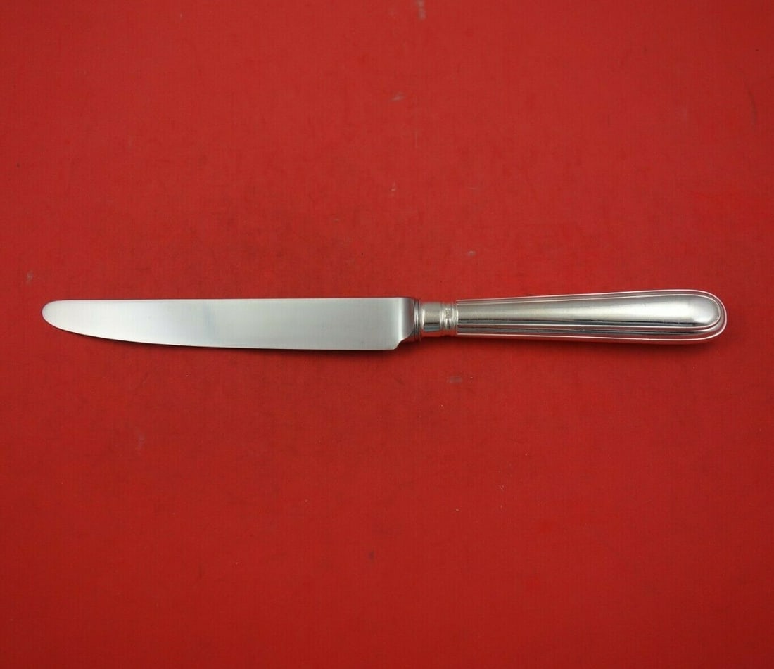 CJ Vander Thread Sterling Silver Dinner Knife 9 7/8 Inch: CJ Vander Thread Sterling Silver Dinner Knife 9 7/8 Inch This exquisite dinner knife from the renowned Thread pattern by CJ Vander features a sterling silver hollow handle complemented by a durable st