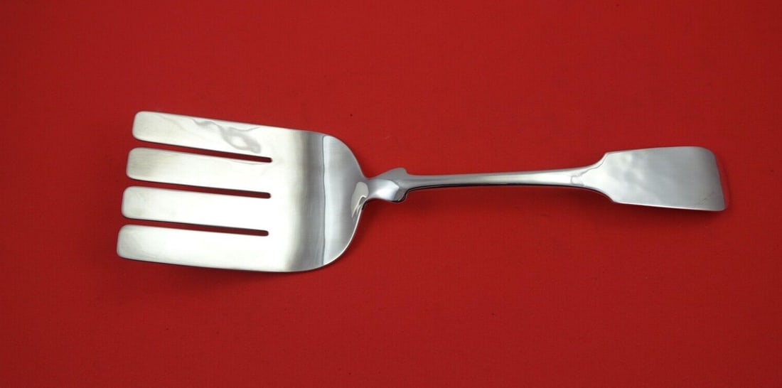 Porter Blanchard Fiddle Sterling Silver Serving Fork 9 3/4 in: Porter Blanchard Fiddle Sterling Silver Serving Fork 9 3/4 in This elegant asparagus fork features a classic Fiddle pattern by Porter Blanchard. Crafted from high-quality sterling silver, this serving