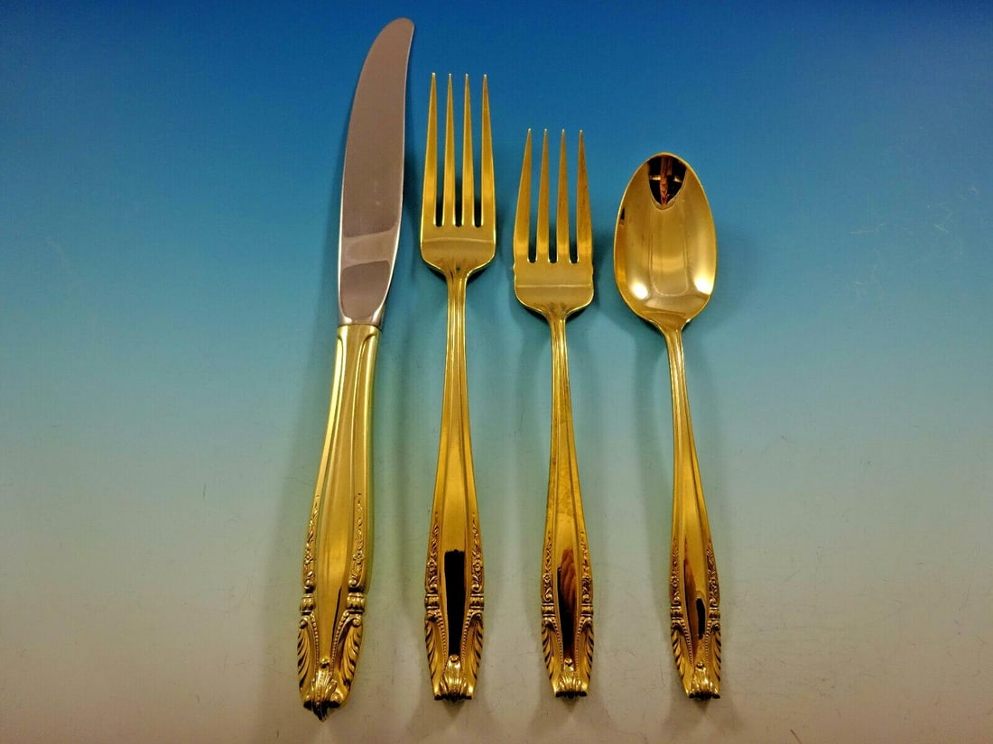 Wallace Stradivari Vermeil Sterling Silver 4-Piece Place Setting: Wallace Stradivari Vermeil Sterling Silver 4-Piece Place Setting This exquisite 4-piece place setting from the Stradivari pattern by Wallace is crafted from sterling silver with a luxurious vermeil (g