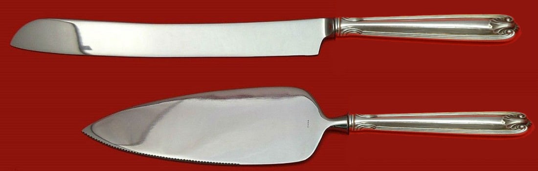 Towle Sterling Silver Benjamin Franklin Wedding Cake Set 2pc: Towle Sterling Silver Benjamin Franklin Wedding Cake Set 2pc This exquisite wedding cake set features the classic Benjamin Franklin pattern by Towle, crafted from high-quality sterling silver. The set