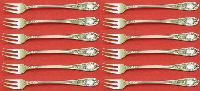 International Sterling Silver Fontaine Cocktail Fork Set 12 Pieces: International Sterling Silver Fontaine Cocktail Fork Set 12 Pieces Enhance your dining experience with this elegant 12-piece cocktail fork set from the Fontaine pattern by International Sterling. Each