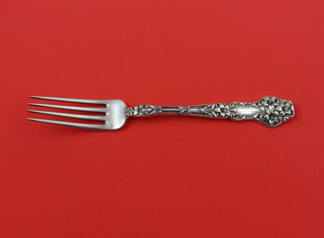 Watson Magnolia Sterling Silver Dinner Fork Art Nouveau 7 3/4": Watson Magnolia Sterling Silver Dinner Fork Art Nouveau 7 3/4" This exquisite dinner fork is part of the Magnolia pattern by Watson, crafted from high-quality sterling silver. With its Art Nouveau sty