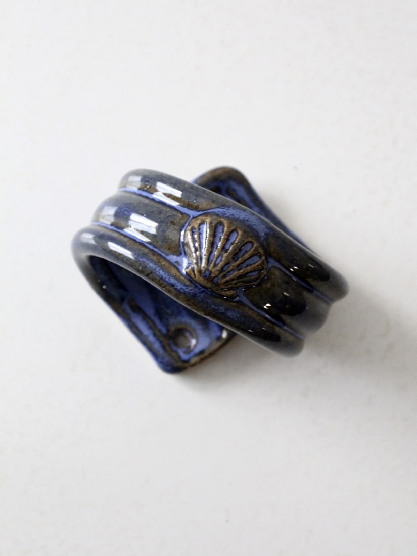 Vintage Coastal Studio Pottery Towel Holder Nautical Seashell Design: Vintage Coastal Studio Pottery Towel Holder Nautical Seashell Design Enhance your bathroom decor with this charming vintage coastal studio pottery towel holder. Featuring a delightful nautical seashel