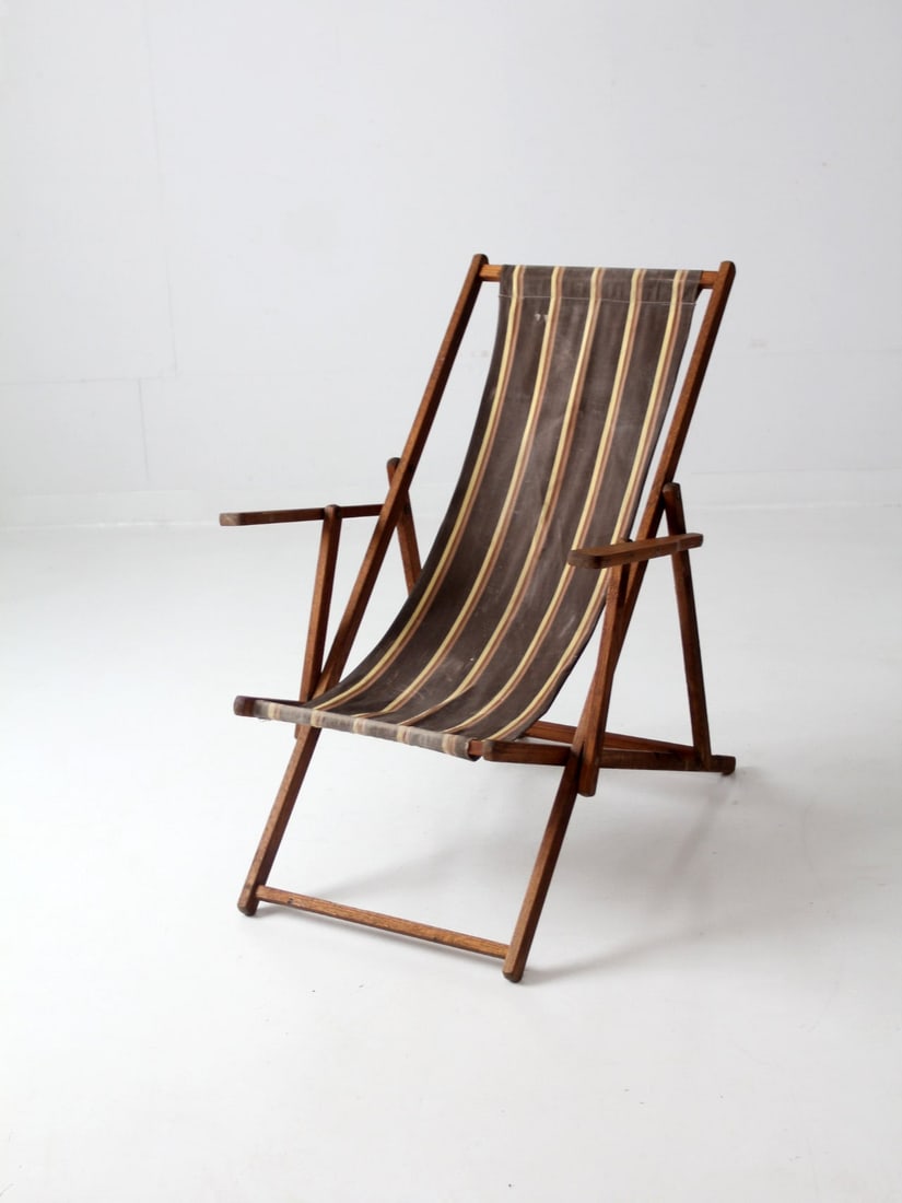Vintage Mid Century Striped Canvas Deck Chair: Vintage Mid Century Striped Canvas Deck Chair Embrace vintage charm with this Mid Century Striped Deck Chair, a classic piece from the mid 20th century. Featuring a soft brown striped canvas that beau