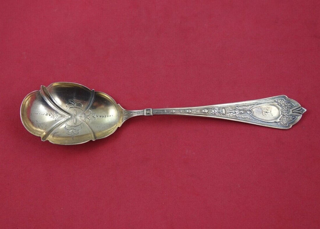 Schulz & Fischer Cleopatra Sterling Silver Preserve Spoon 7 Inch: Schulz & Fischer Cleopatra Sterling Silver Preserve Spoon 7 Inch This exquisite serving spoon is a part of the Cleopatra pattern by Schulz & Fischer, crafted from sterling silver. The bright-cut desig