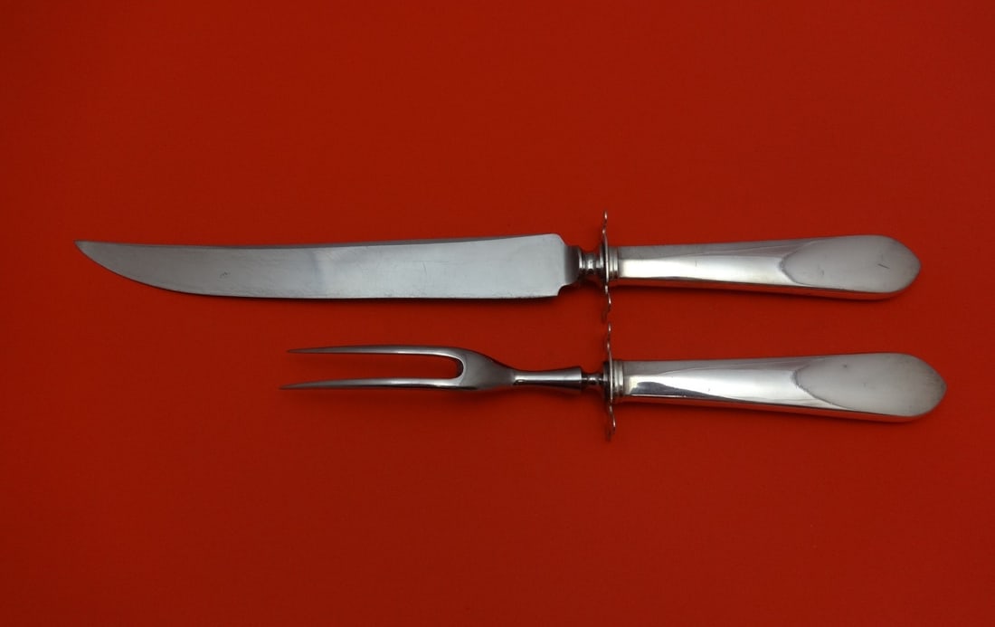 Stieff Betsy Patterson Sterling Silver Carving Set 2pc Knife & Fork: Stieff Betsy Patterson Sterling Silver Carving Set 2pc Knife & Fork This elegant 2-piece roast carving set features a knife and fork, both crafted in the exquisite Betsy Patterson pattern by Stieff. T