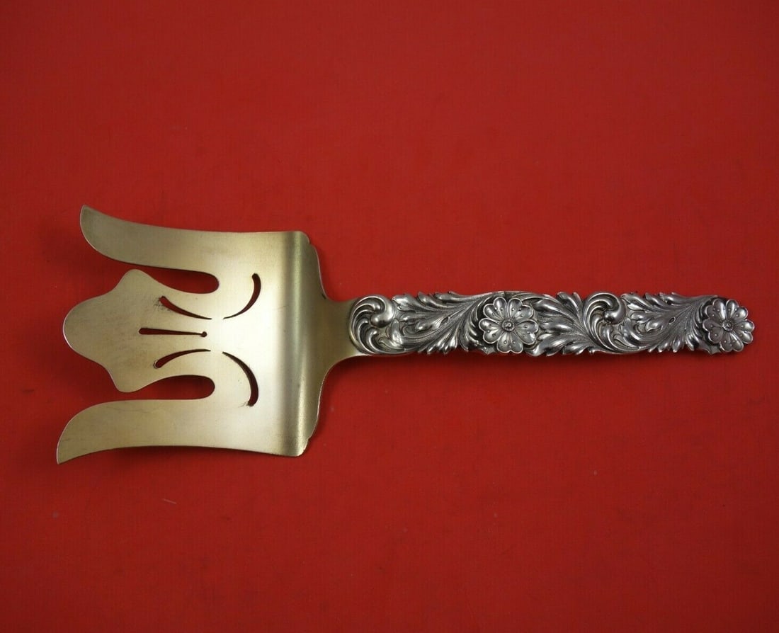 Shiebler Gold Washed Sterling Silver Asparagus Fork 10 1/4 Inch Serving: Shiebler Gold Washed Sterling Silver Asparagus Fork 10 1/4 Inch Serving This exquisite asparagus fork from Shiebler features a stunning gold wash over sterling silver, measuring 10 1/4 inches in lengt