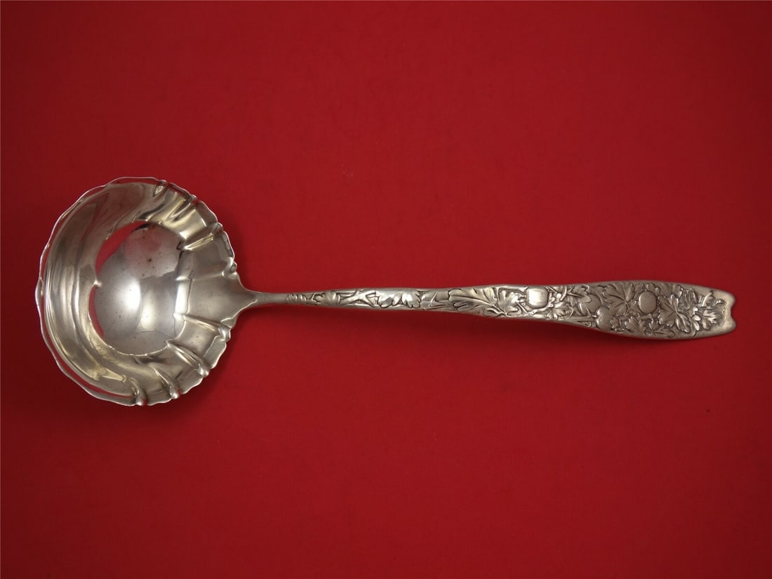 Whiting Berry Sterling Silver Soup Ladle Gooseberry Motif 13 3/4": Whiting Berry Sterling Silver Soup Ladle Gooseberry Motif 13 3/4" This exquisite soup ladle from the Berry pattern by Whiting showcases a stunning fluted design complemented by a charming gooseberry h