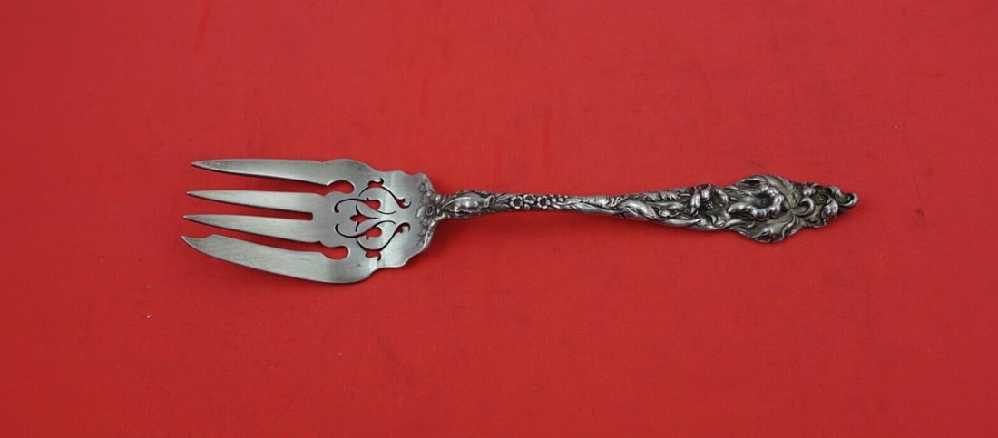 Reed and Barton Les Six Fleurs Sterling Silver Cold Meat Fork Extra Piercings: Reed and Barton Les Six Fleurs Sterling Silver Cold Meat Fork Extra Piercings This exquisite serving fork from the Les Six Fleurs pattern by Reed & Barton is crafted from high-quality sterling silver.