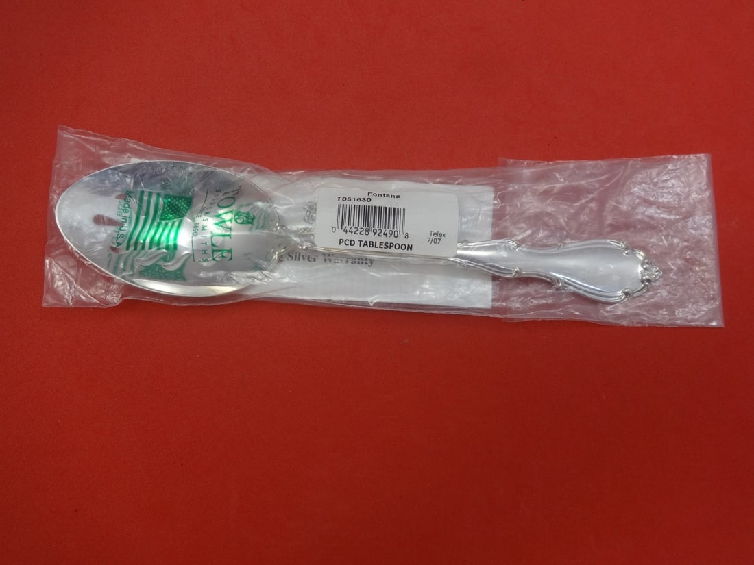 Towle Fontana Sterling Silver Slotted Serving Spoon 8 1/2 inches: Towle Fontana Sterling Silver Slotted Serving Spoon 8 1/2 inches Enhance your dining experience with this exquisite Fontana by Towle Sterling Silver Slotted Serving Spoon. Measuring 8 1/2 inches, this