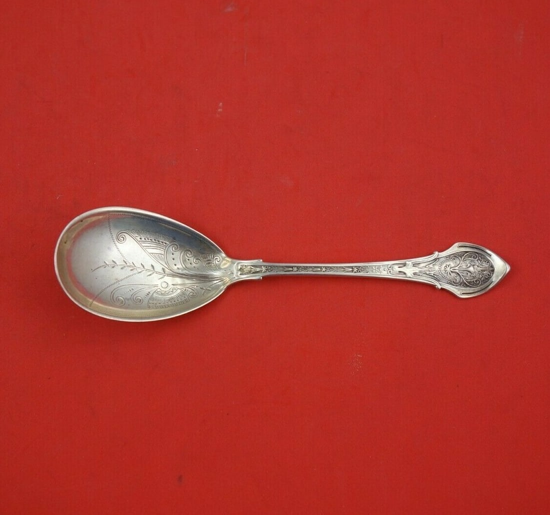 Wood & Hughes Angelo Sterling Silver Preserve Spoon Bright-Cut 6 3/8": Wood & Hughes Angelo Sterling Silver Preserve Spoon Bright-Cut 6 3/8" This exquisite preserve spoon is crafted from sterling silver by Wood & Hughes in the elegant Angelo pattern, showcasing a bright-