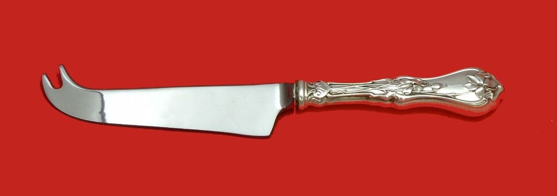 Whiting Violet Sterling Silver Cheese Knife with Hollow Handle: Whiting Violet Sterling Silver Cheese Knife with Hollow Handle This exquisite cheese knife features the elegant Violet pattern by Whiting, crafted from high-quality sterling silver. The knife includes