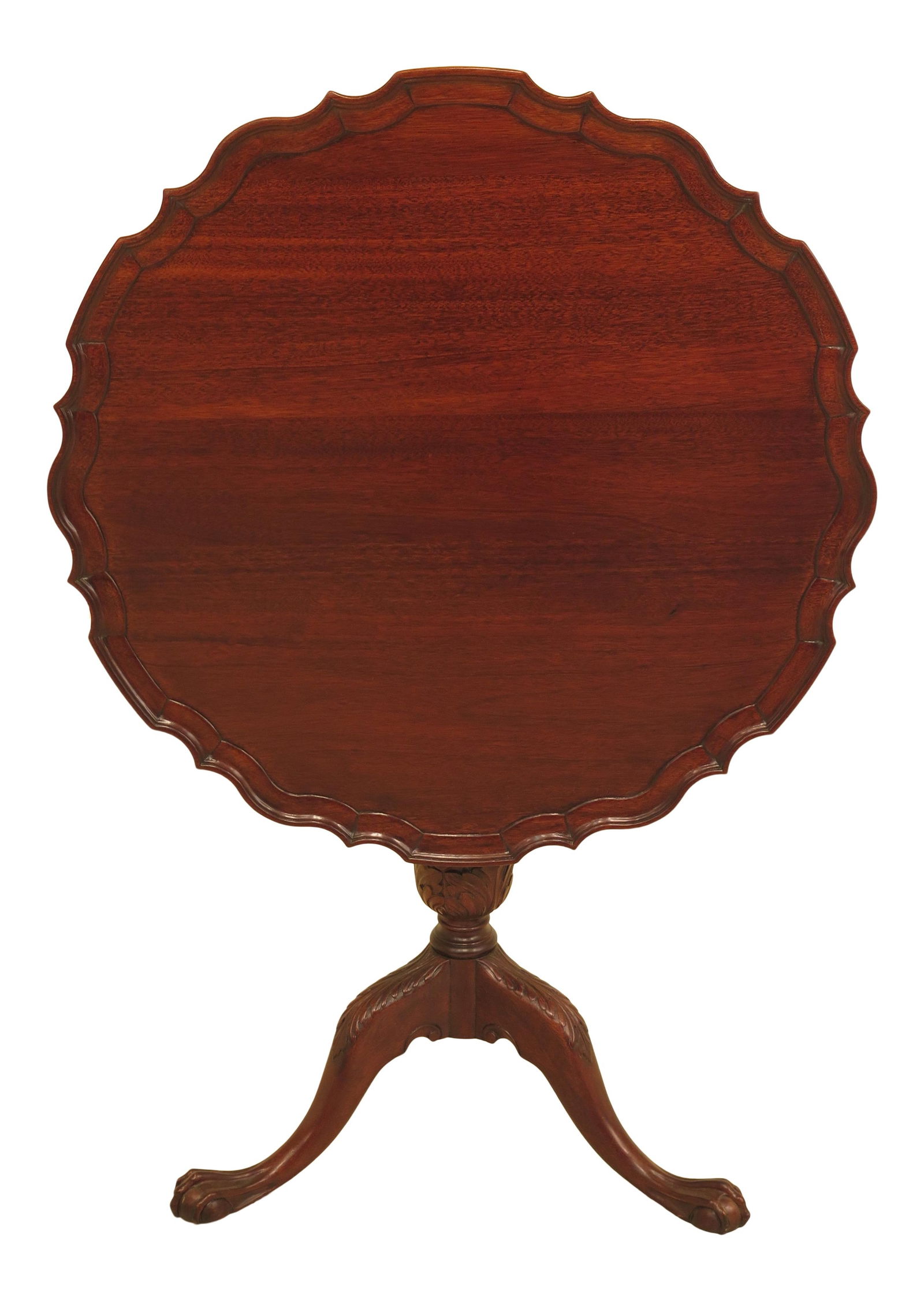 Vintage 1950s Mahogany Chippendale Tilt Top Table: Vintage 1950s Mahogany Chippendale Tilt Top Table This exquisite 1950s Chippendale-style mahogany tilt top table showcases elegant carved details and a charming pie crust top. Professionally refinishe