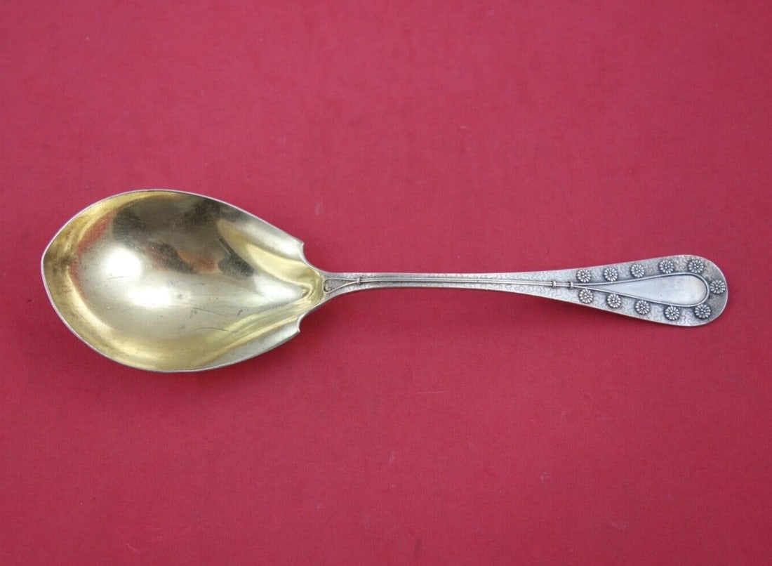 Tiffany & Co Daisy Sterling Silver Berry Spoon 9 inch Gold Washed: Tiffany & Co Daisy Sterling Silver Berry Spoon 9 inch Gold Washed This exquisite 9" berry spoon from Tiffany & Co. features the elegant Daisy pattern and is crafted from high-quality sterling silver.