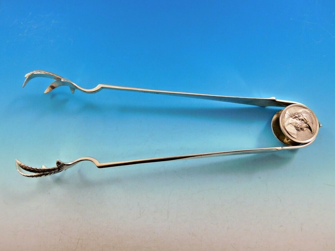 Gorham Medallion Sterling Silver Ice Tong 10 Double Claw Monogrammed: Gorham Medallion Sterling Silver Ice Tong 10 Double Claw Monogrammed This stunning sterling silver ice tong, crafted by Gorham in the Medallion pattern, measures 10" in length. The piece features intr