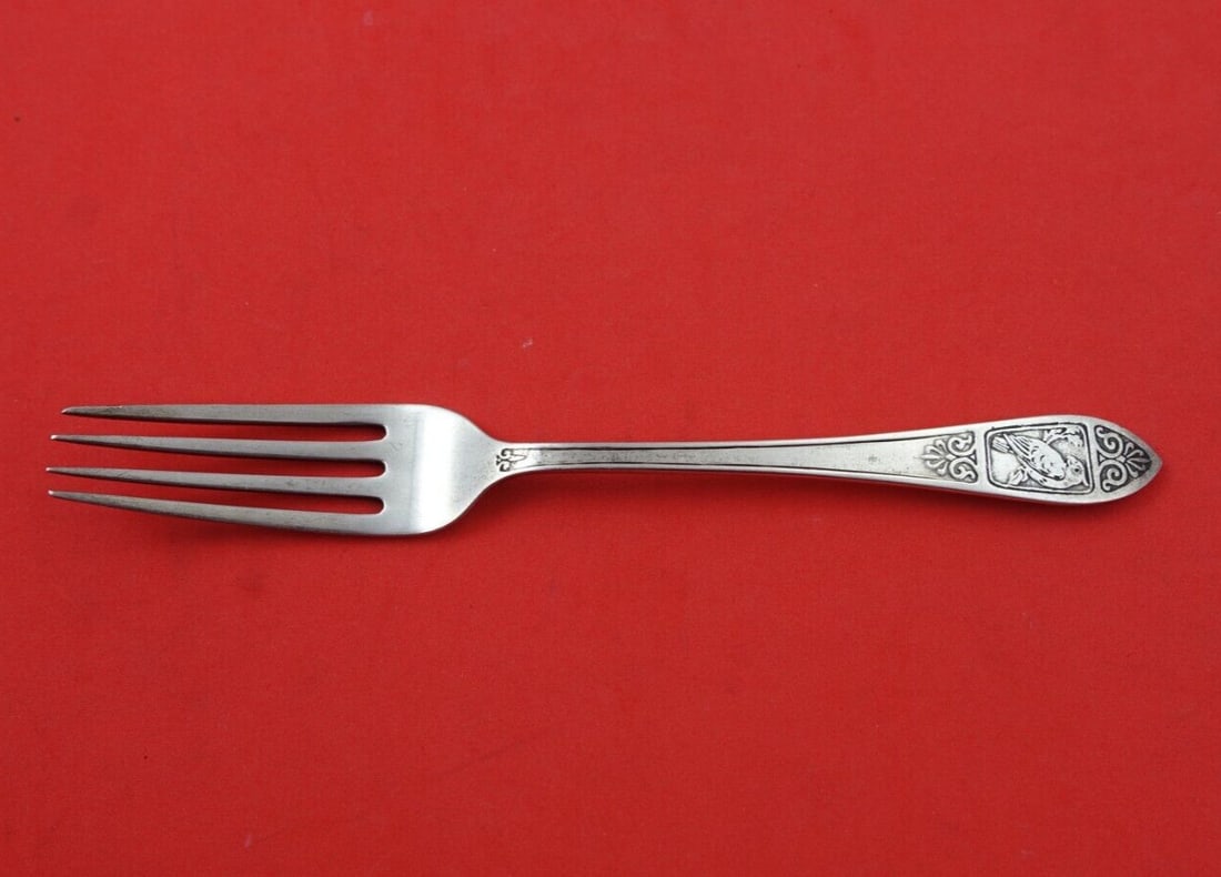 Tiffany & Co. Sterling Silver Junior Fork 6.375 Parrot Motif: Tiffany & Co. Sterling Silver Junior Fork 6.375 Parrot Motif Discover this exquisite Tiffany & Co. sterling silver junior fork featuring a unique acid etched parrot bird motif. Measuring 6 3/8 inches,