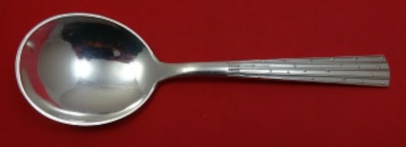 Orla Vagn Mogensen Champagne Sterling Silver Preserve Spoon 6 7/8" Design #12: Orla Vagn Mogensen Champagne Sterling Silver Preserve Spoon 6 7/8" Design #12 This exquisite preserve spoon, crafted by renowned Danish silversmith Orla Vagn Mogensen, features a stunning modernist de