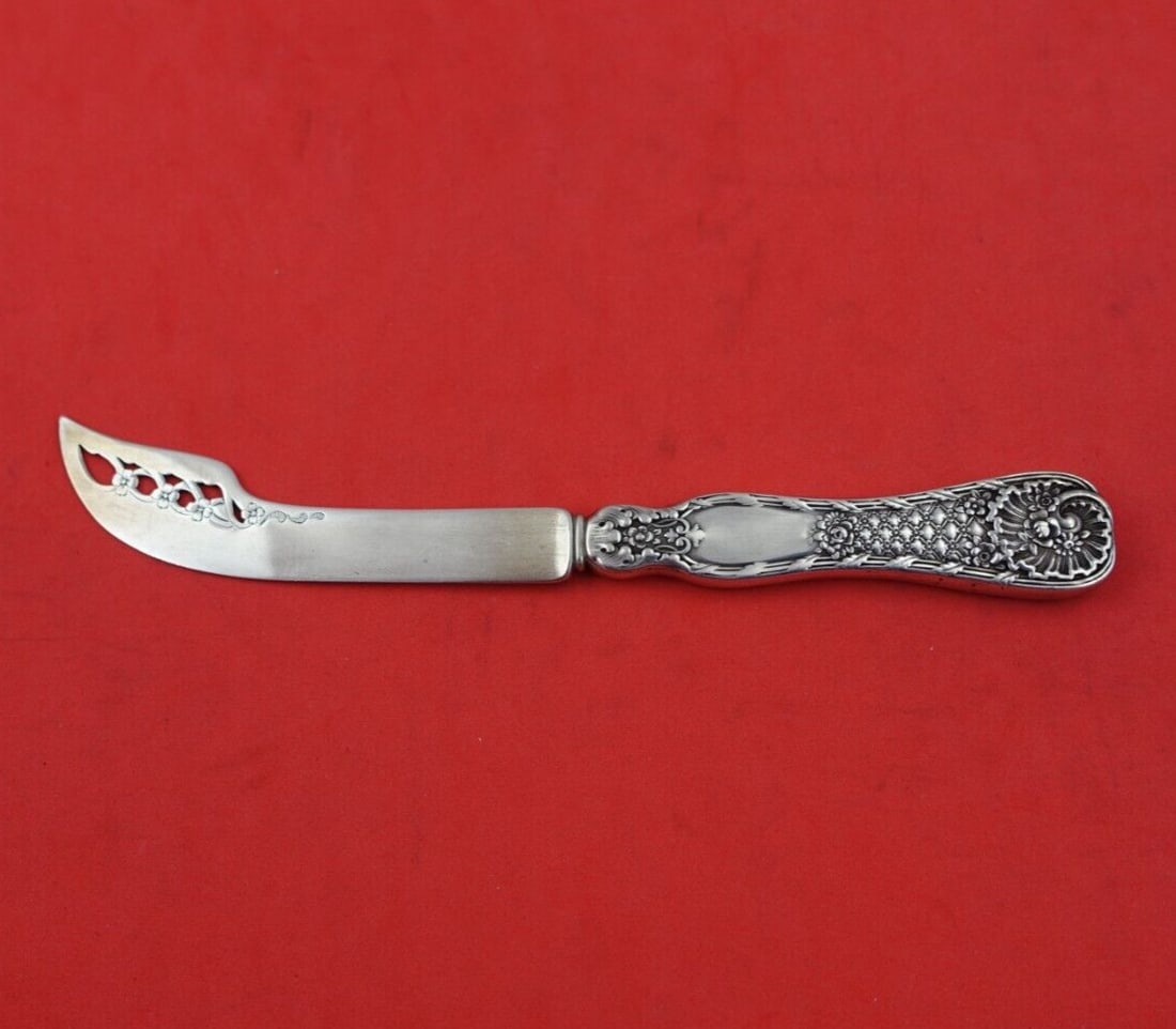 Tiffany & Co Pocket Handle Sterling Silver Cheese Knife 6 1/8": Tiffany & Co Pocket Handle Sterling Silver Cheese Knife 6 1/8" This exquisite cheese knife features a pocket handle design by Tiffany & Co., crafted from high-quality sterling silver. The knife showca