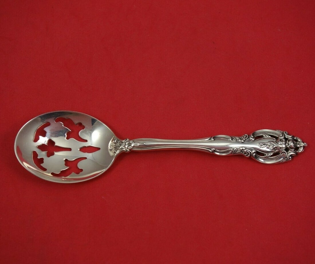 Gorham La Scala Sterling Silver Sugar Sifter Custom 6 1/4 inches: Gorham La Scala Sterling Silver Sugar Sifter Custom 6 1/4 inches Enhance your dining experience with this exquisite La Scala Sterling Silver Sugar Sifter by Gorham. This custom-made piece, measuring 6